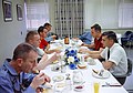 The Gemini 8 crew at prelaunch breakfast (Face of Shepard is obscured)