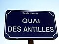 image:streetsign=https://upload.wikimedia.org/wikipedia/commons/7/71/Nantes_quai_Antilles.jpg