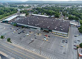 A flyover view of a Menards home improvement store