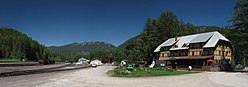 The Izaak Walton Inn is built next to a railroad helper station