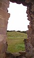 A degraded arrow slit that once defended the north side of the castle.