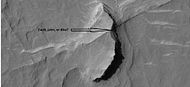 Possible fault along a butte, as seen by HiRISE under HiWish program. These may be part of linear ridge networks that are produced with impact craters.