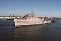 The USS Shreveport being towed down the Delaware River as she heads for scrapping.