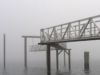 Pier in fog, Sydney, Vancouver Island