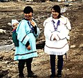 Inuit mothers wearing amautit (women parkas with hood), Pond Inlet 1995