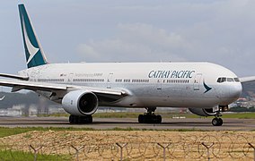 A Boeing 777-300 (B-HNK) in The Spirit of Hong Kong special livery.