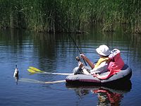 Fishing a black-bass in a float-tube