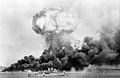 Image 4An oil storage tank explodes during the first Japanese air raid on Darwin on 19 February 1942 (from Military history of Australia during World War II)