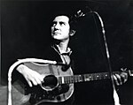 Phil Ochs sur scène en mai 1973.