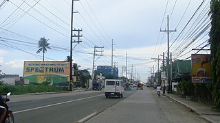 A part of the Gen. Douglas MacArthur Highway cutting across Barangay Lolomboy, Bocaue.