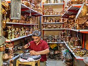 Coppersmiths with Copper objects