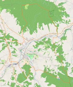 Mapa konturowa Rabki-Zdroju, w centrum znajduje się punkt z opisem „I Liceum Ogólnokształcące im. Eugeniusza Romera w Rabce-Zdroju”