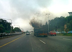 Exhaust fumes from a truck on the road in South Africa