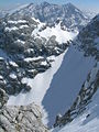 The Blaueis Glacier, Blaueis wind gap (Blaueisscharte) and peak of the Blaueisspitze. Behind: the Watzmann