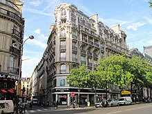 Photo d'un immeuble haussmannien sur le boulevard des Italiens