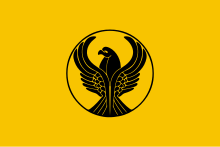 Stylized eagle, wings spread, looking over its left shoulder. Flat yellow background.