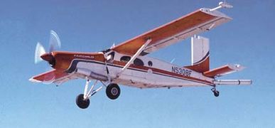 Un PC-6/C-H2 de l'U.S. Geological Survey en 1992 équipé d'un magnétomètre pour mesurer les variations du champ magnétique terrestre.