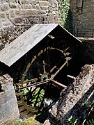 Photographie de la roue à aubes du rouet de chez Lyonnet, alors en état de fonctionnement.