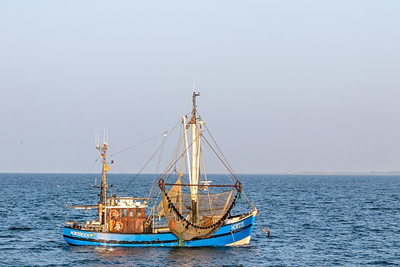 A shrimping boat (NOR225) in the wadden sea of Germany.