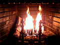 Wood-burning fireplace with fire dogs