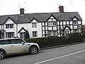 Berriew, Montgomeryshire. The Sign: Vaynor Estate Cottages