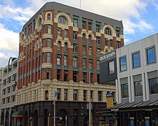 Manchester Courts, Christchurch (Nueva Zelanda), Sidney and Alfred Luttrell (1905-1906).[14]​