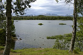 View towards southwest. The tall mountain in the background is Middagstind on Kvaløya.