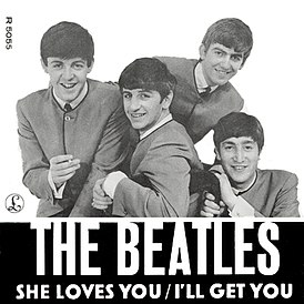 Обложка сингла The Beatles «She Loves You» (1963)