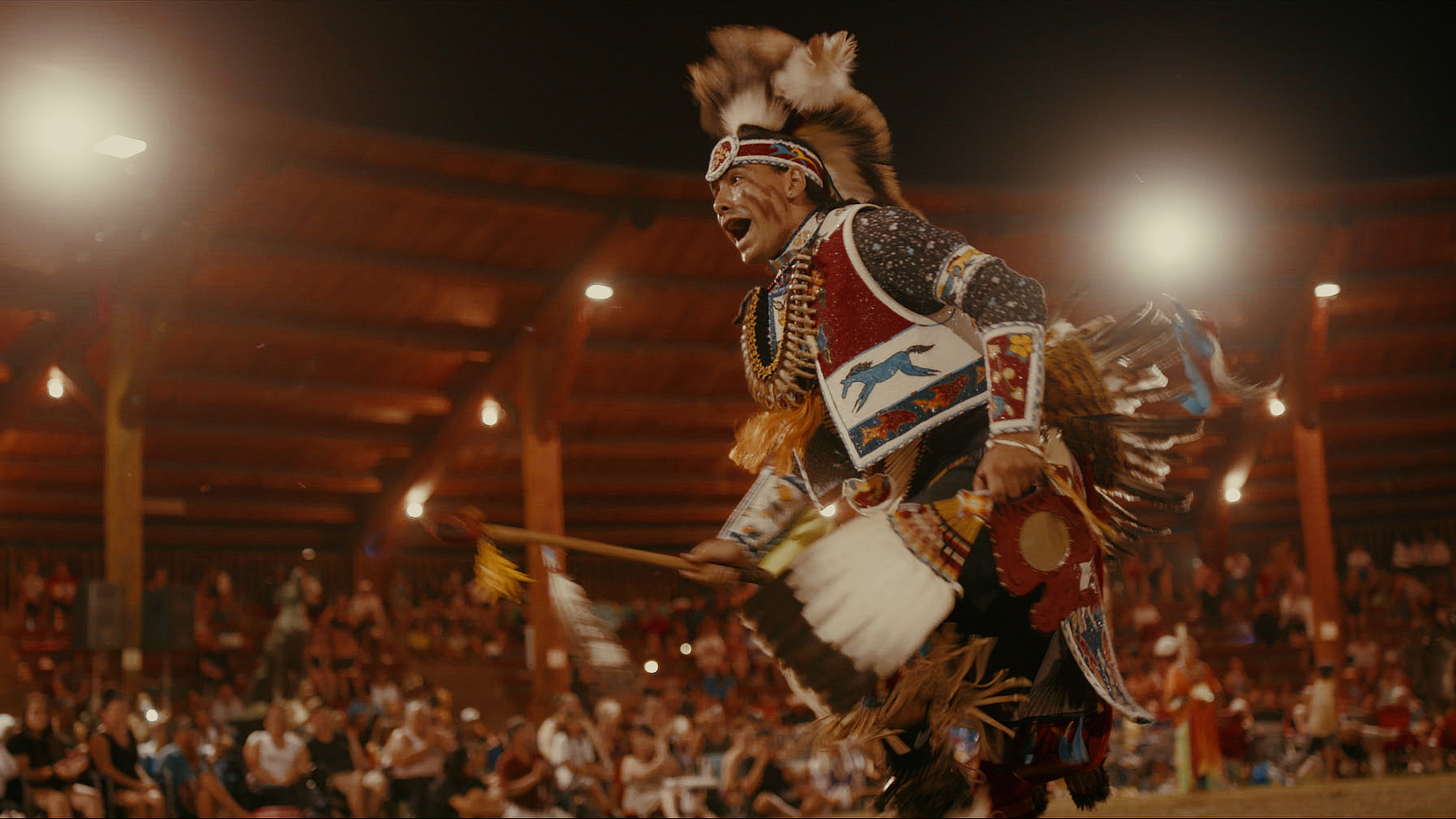 Julian Brave NoiseCat competes at the Kamloopa Powwow held on the campus of the former Indian residential school where the first suspected graves of students were discovered in Canada. (Credit: Emily Kassie/Sugarcane Film LLC)