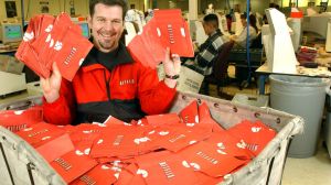 400303 02: Netflix.com Chief Executive Officer Reed Hastings sits in a cart full of ready-to-be-shipped DVDs January 29, 2002 in San Jose, CA. The online DVD rental site has 500,000 subscribers who can rent, receive and return unlimited discs per month by mail. (Photo By Justin Sullivan/Getty Images)